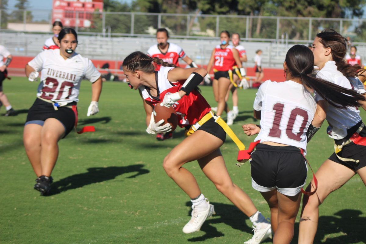 Starla Skiles running a play