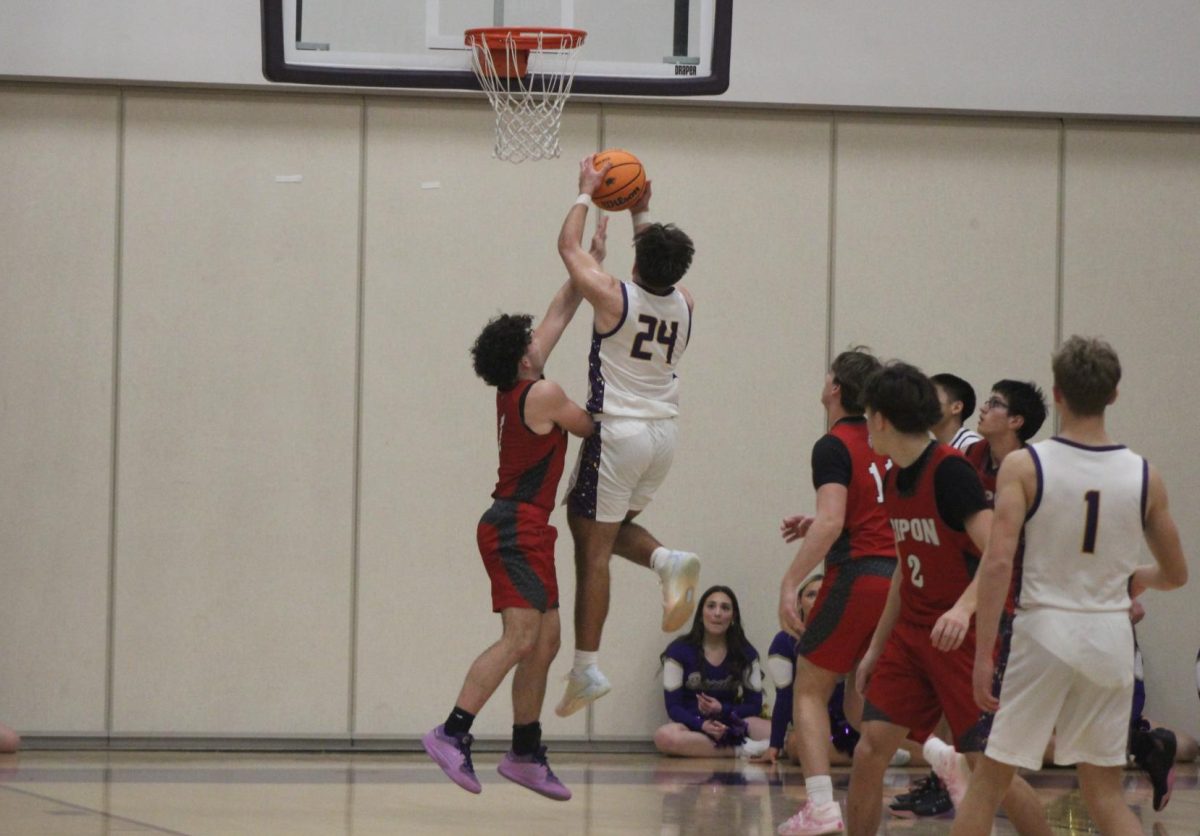 RHS Boys Basketball Takes Tough Loss After Competitive Game Against Rivals